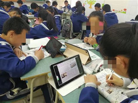 b9k38_云南一中学以学生是否购买平板分班