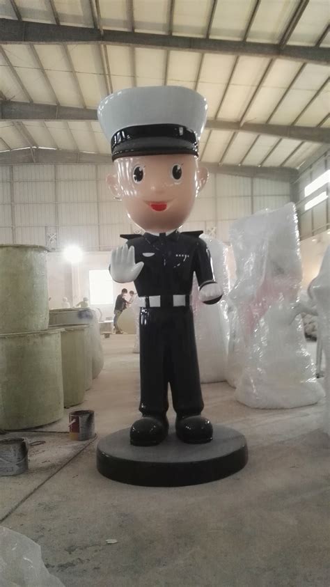 玻璃钢卡通警察造型雕塑